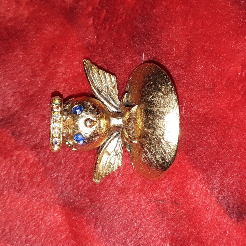 Vintage Tortolani classic angel shoulder brooche pin